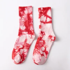 lose-up of tie dye socks in blue, pink, yellow, black, green and yellow